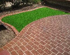 Another view of this fantastic Eurobrick edging, Artificial Grass and Stencil concrete installation